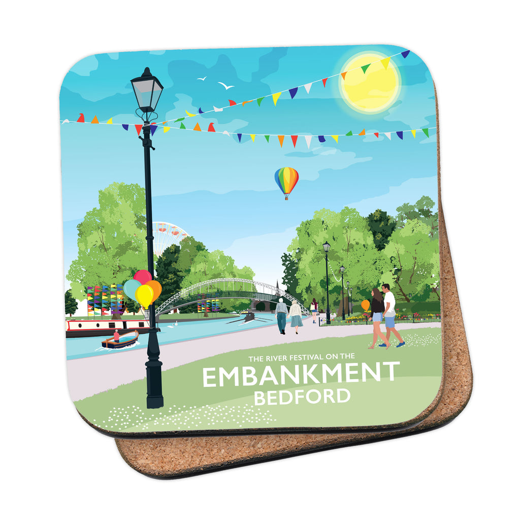 a coaster with a picture of a park and a bridge