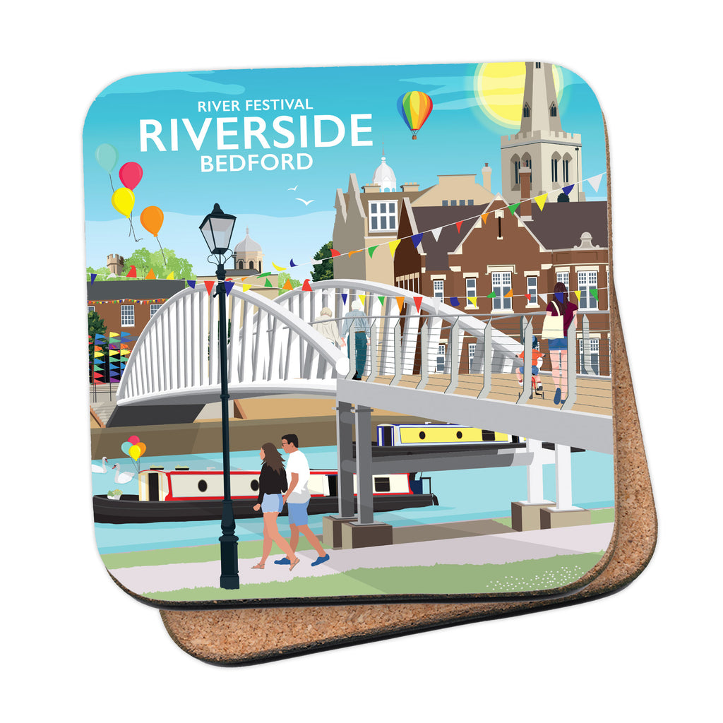 a coaster with a picture of people walking across a bridge